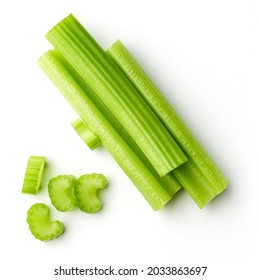Heap of celery sticks isolated on white background, top view