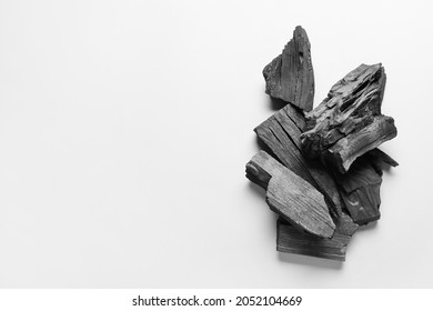 Heap of charcoal on white background