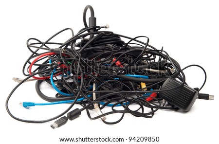Heap of computer cables isolated on white