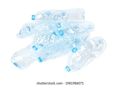 Heap of crumpled empty plastic water bottles isolated on white background