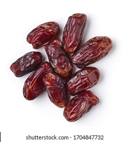 Heap of dates isolated on white background; top view