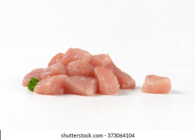 Heap Of Diced Turkey Breasts On White Background