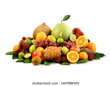 A heap of different tropical fruits isolated on white background. Healthy and organic fair concept. - Image - Shutterstock ID 1447889492
