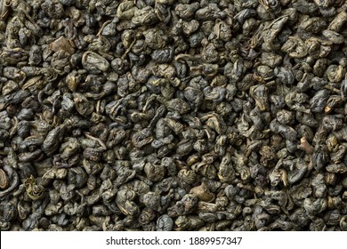 Heap Of Dried Chinese Green Gunpowder Tea Full Frame As Background