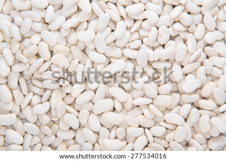 Heap of dried white beans as food background (or as texture) Stock foto © 