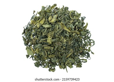 Heap of dry leaf green tea isolated on white background, top view.