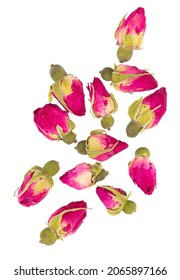 Heap of dry tea roses buds isolated on white background. Rose flower tea. Clipping path. Top view.