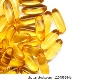 heap of fish oil capsules isolated on white background