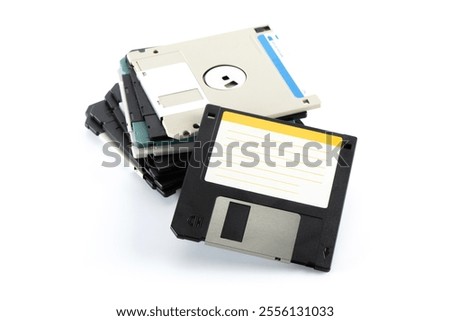 Heap of floppy disk or diskette, magnetic data storage medium for computer.