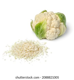 Heap Of Fresh Cut Cauliflower Rice And Whole Cauliflower Isolated On White Background 