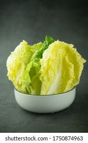 Heap Fresh Of Green Leaf Iceberg Lettuce For Wrap Thai Food In Bowl On Black Background