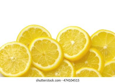 Heap Of Fresh Lemon Slices On White Background