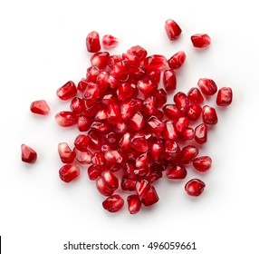 Heap of fresh pomegranate seeds isolated on white background, top view
