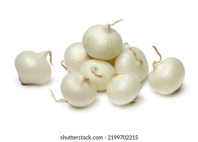 Heap of fresh raw pearl onions close up isolated on white background 