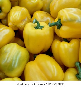 A Heap Fresh Yellow Capsicum In The Market 