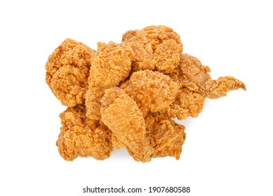 Heap of fried chicken isolated on white background. Top view