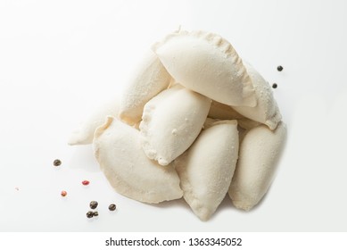 heap of frozen dumplings on a white background. Isolated Dumplings