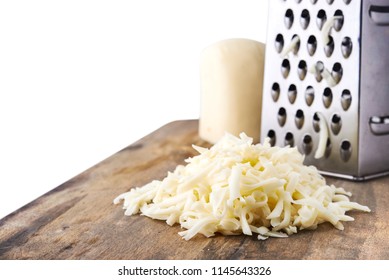 Heap Of Grated Mozzarella Cheese For Pizza Isolated On White Background