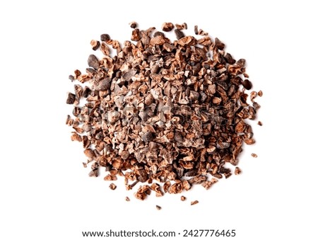 Heap of Organic Cacao Nibs. Top View. Isolated on White Background. Vegan Chocolate Concept.
