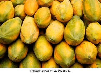 Heap of papaya fruit, stacked of papaya background 