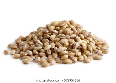 Heap of pearl barley isolated on white. - Shutterstock ID 572954836