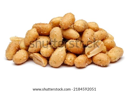 Heap of peeled peanuts isolated on white background
