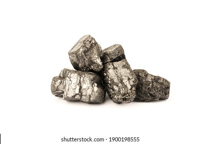Heap of pieces of coal isolated on white background. Fossil coal ..