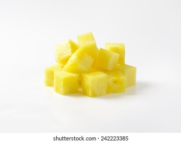 Heap Of Pineapple Slices On White Background