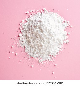 Heap Of Powder Sugar On Pink Background, Top View