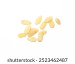 Heap of raw almond flakes isolated on white background. Sliced almonds pile.  Peeled or hulled almond slices pile isolated.