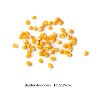 Heap Of Raw Popcorn Grains Isolated On White Background. Dry Yellow Corns Seeds, Maize Or Sweetcorn Kernels Top View