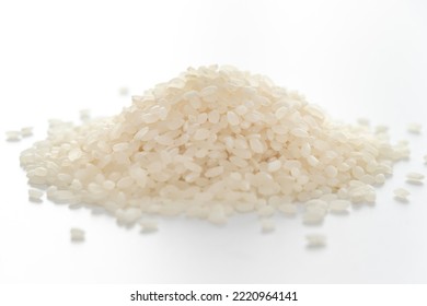 Heap Of Raw White Rice Grains