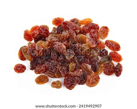 heap of red raisins isolated on white background