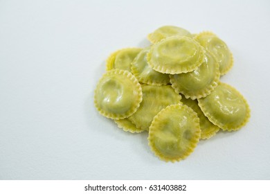 Heap Of Round Ravioli Pasta On White Background