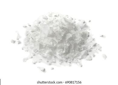 Heap Of Salt Flakes On White Background