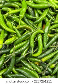 Heap of serrano chili peppers  - Shutterstock ID 2257261211