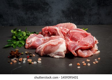 heap of small marbled meat pieces with spices and parsley - Shutterstock ID 1459395431