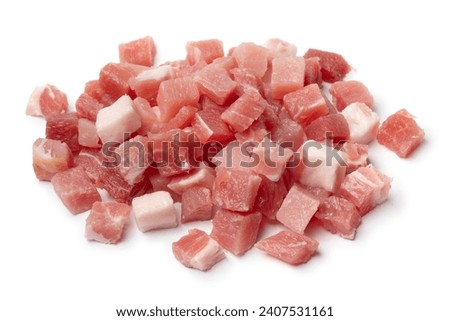 Heap of smoked bacon cubes isolated on white background close up