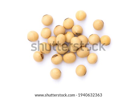 Heap of soy beans isolated on white background. Top view. Flat lay.