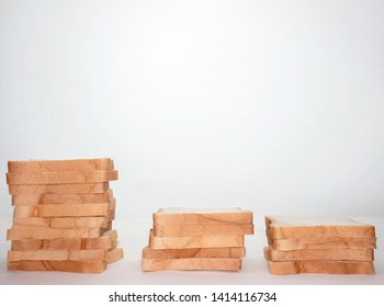 Heap of Stacked Sliced Bread isolated on White Background. - Shutterstock ID 1414116734