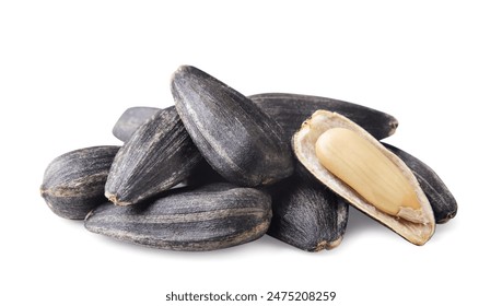 Heap of sunflower seeds and kernel close-up on white background. Isolated