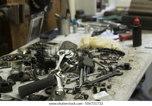 Heap of tools on work\
table