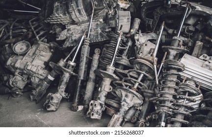 Heap Of Waste Automotive Parts In Old Car Service