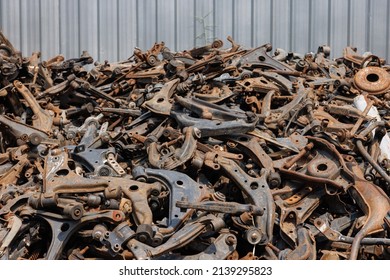 heap of waste automotive parts in recycle factory. scrap metal - predominantly ferrous metals. Waste from industry and household in recycle factory. scrap metal - predominantly ferrous metals.  - Shutterstock ID 2139295823
