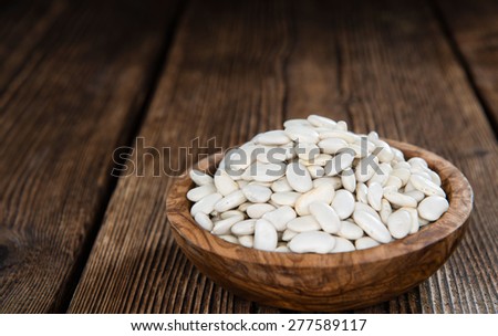 Heap of White Beans (close-up shot) on an old wooden table) Stock foto © 
