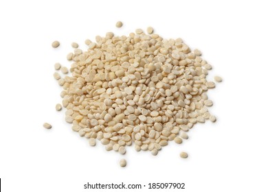 Heap of white lentils close up isolated on white background