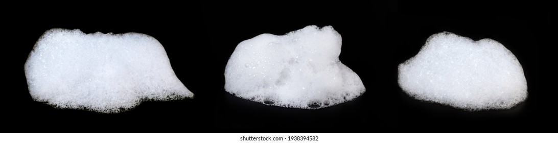 A heap of white soap foam isolated on black background.