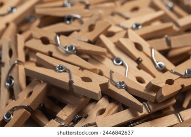 heap wooden clothespins close up. background. - Powered by Shutterstock