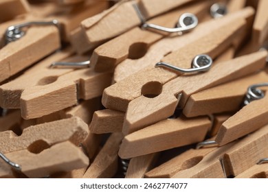 heap wooden clothespins close up. background. - Powered by Shutterstock