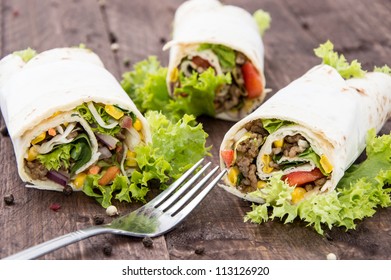 Heap of Wraps on wooden background